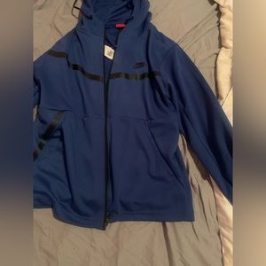 Blue tracksuit for men or women . Price can be negotiated